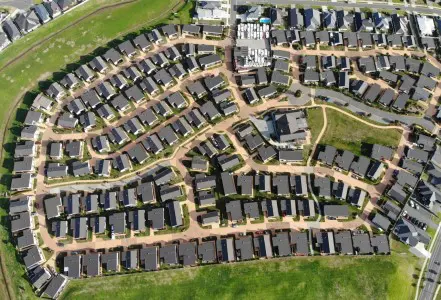 Aerial view of a housing project with new roofs.