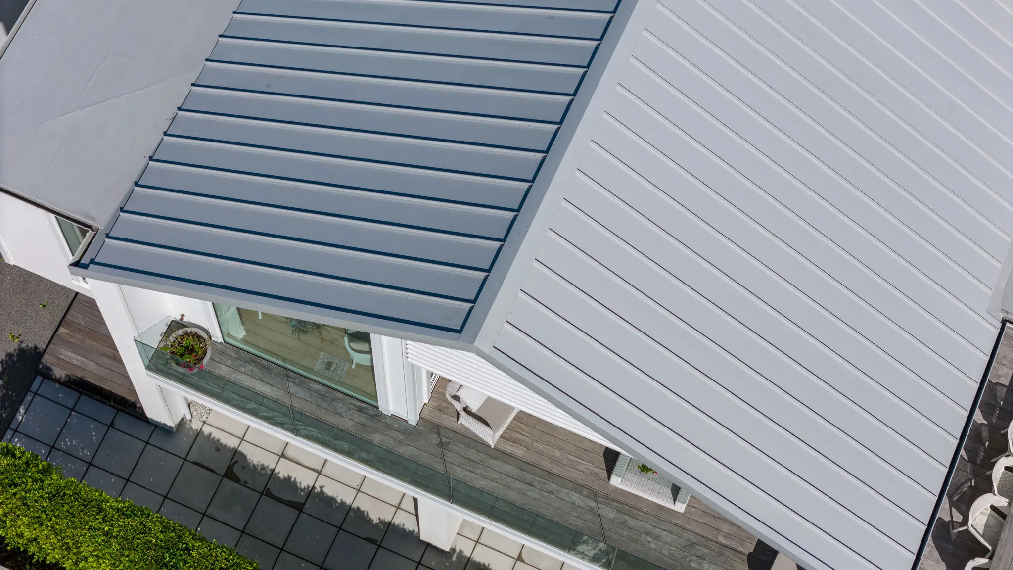 Metal cladding is being installed on a townhouse project.