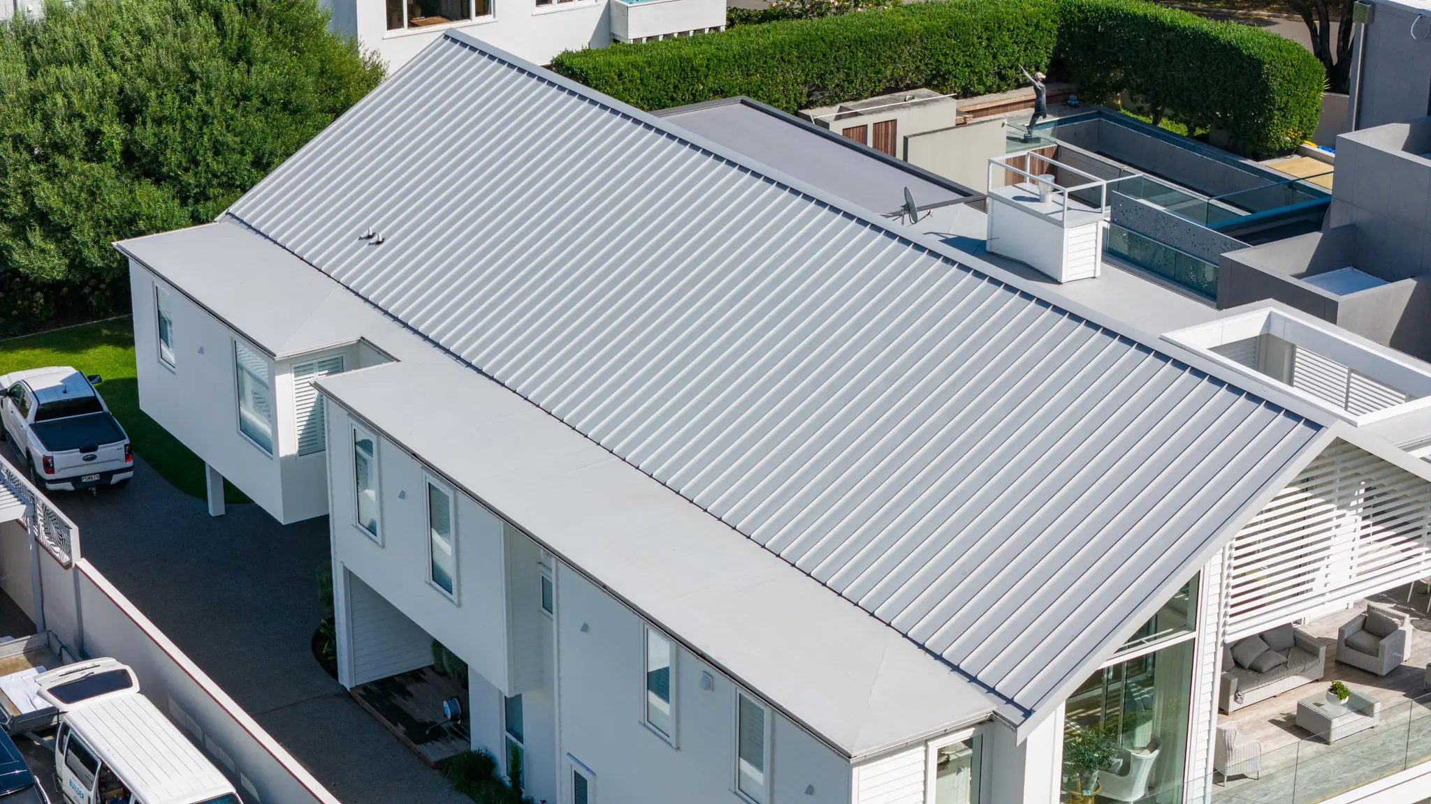 Metal cladding is being installed on a townhouse project.
